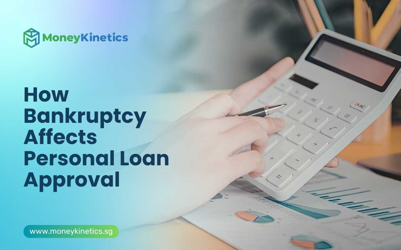 Calculator and financial documents showing bankruptcy's impact on personal loan approval