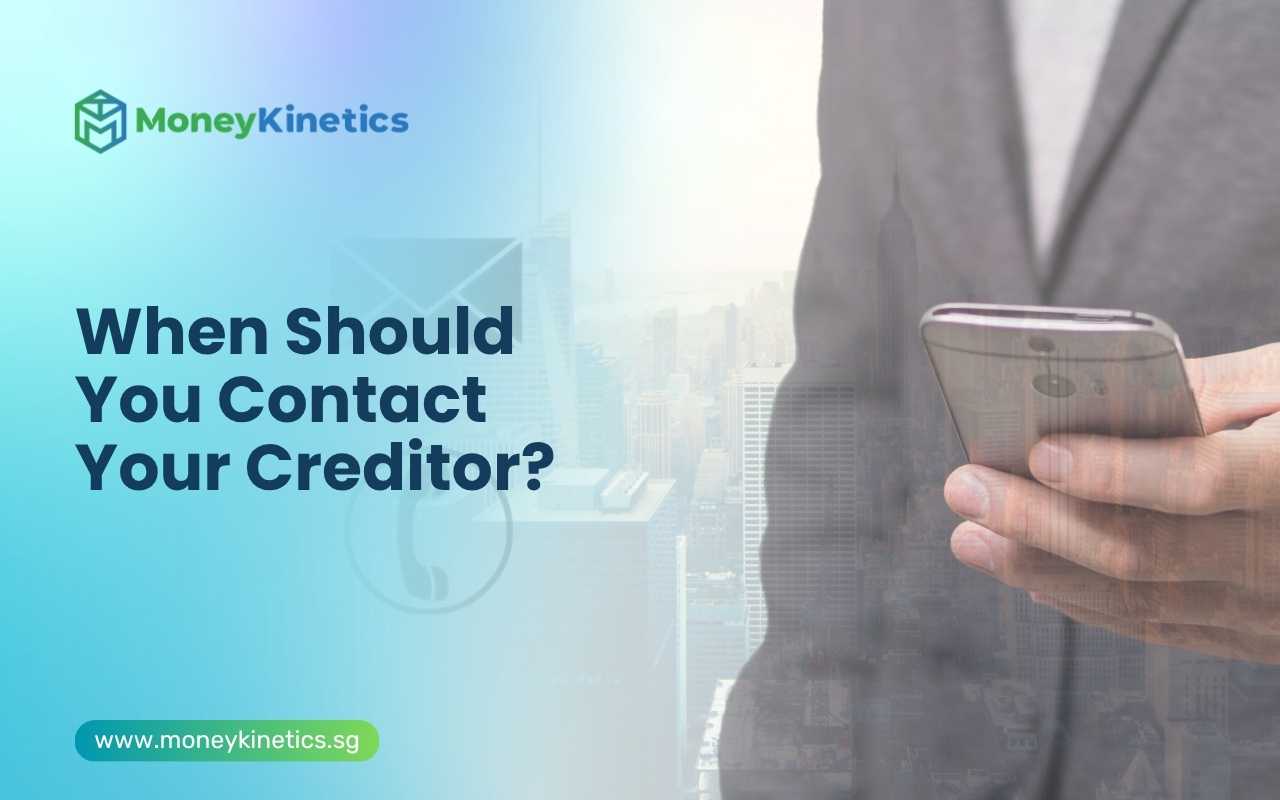Professional using a smartphone to contact a creditor regarding debt repayment in Singapore