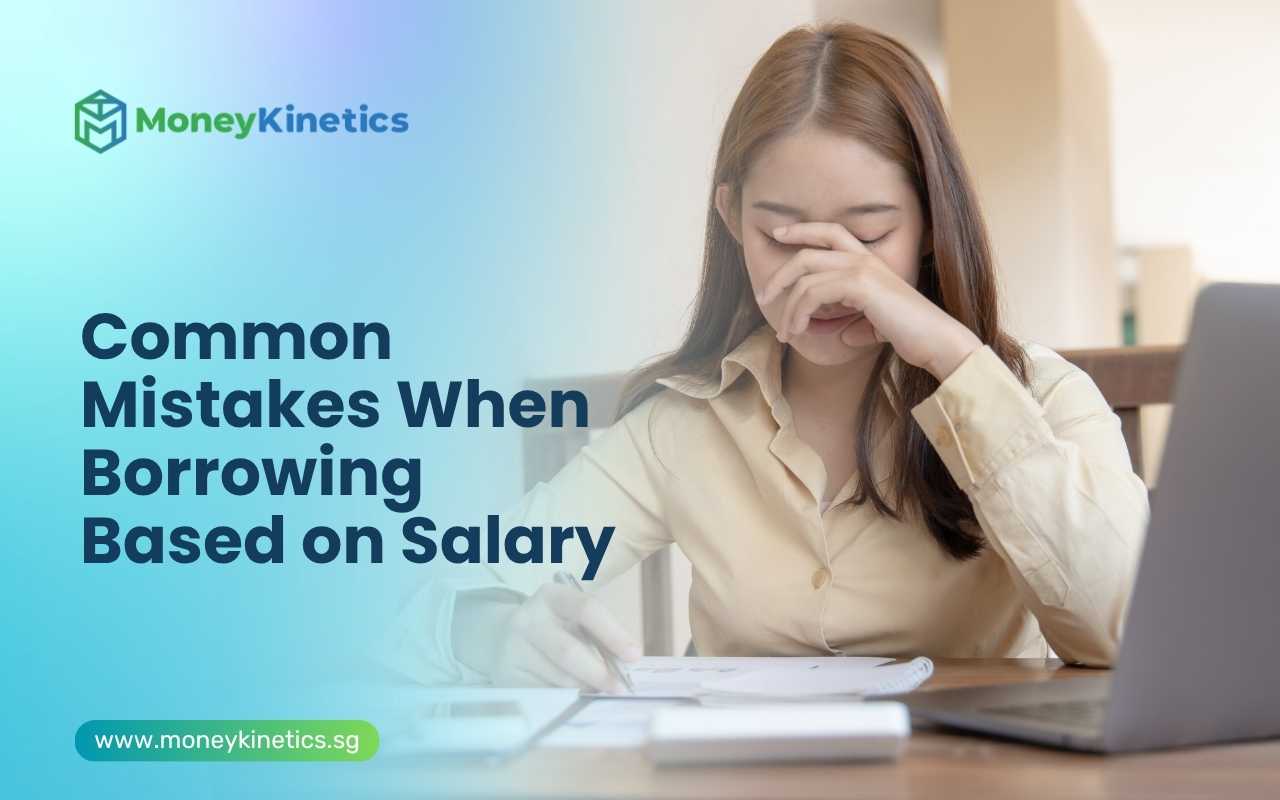 Borrower reviewing financial documents after making common borrowing mistakes based on salary in Singapore