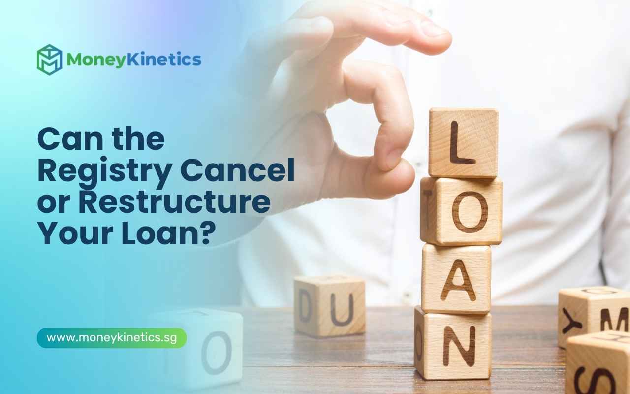 Wooden blocks spelling loan with a hand arranging the letters to represent loan-related decisions.
