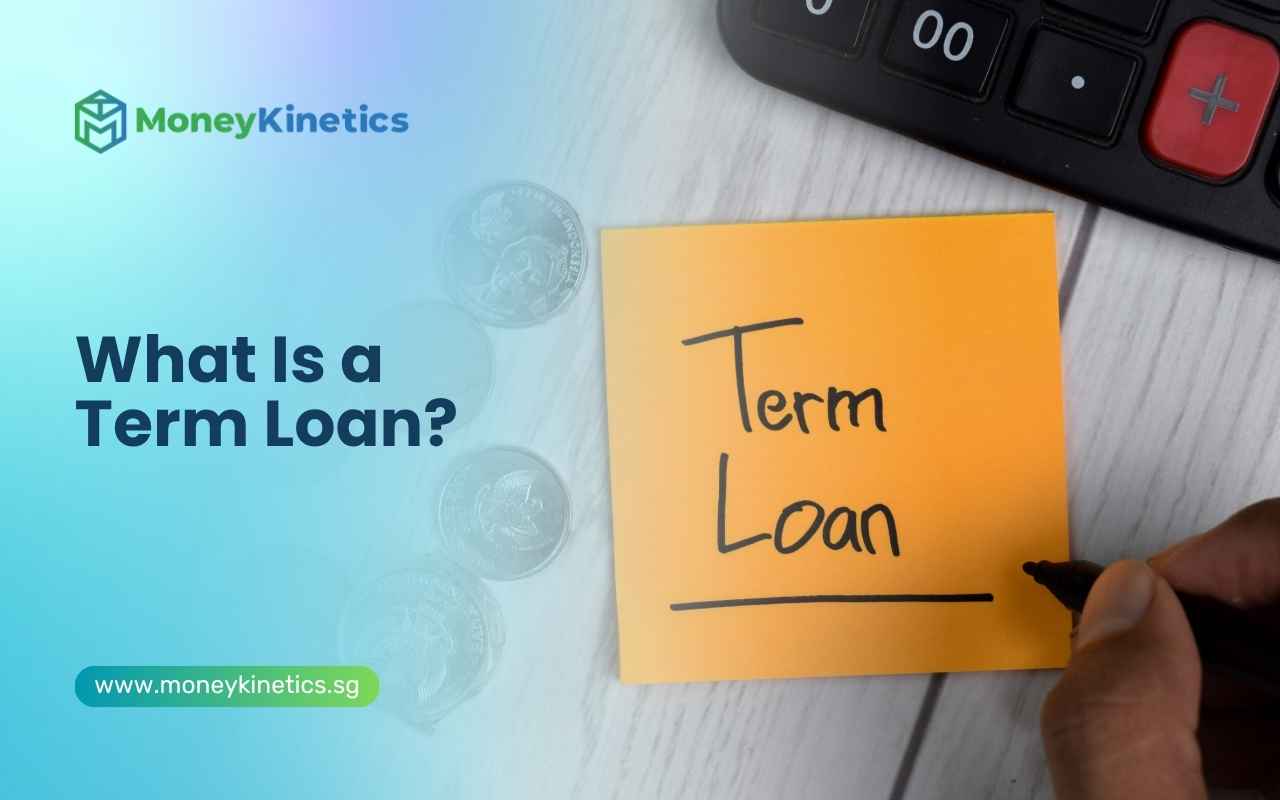 Term loan concept with calculator, coins and a handwritten loan note.